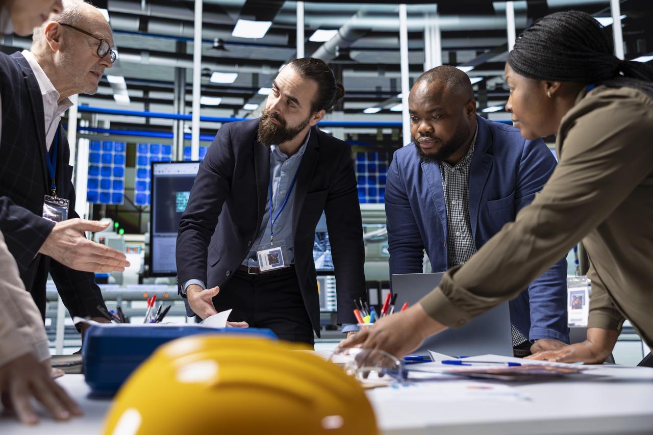 Engineering team discussing a project in an office